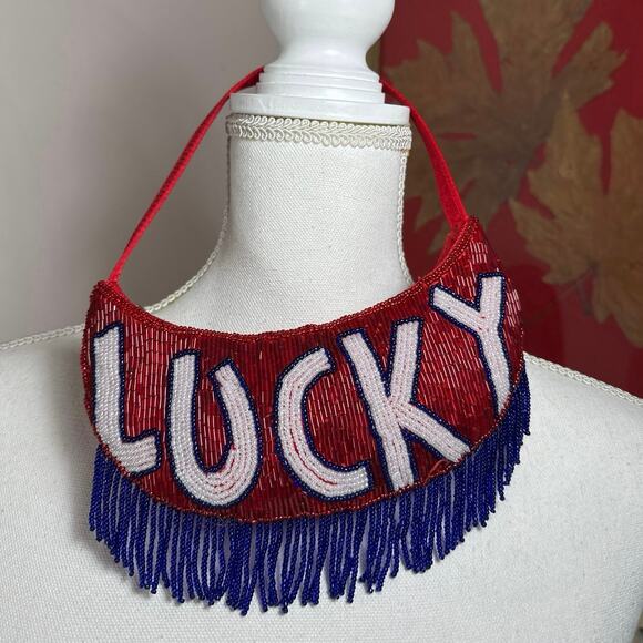 Small Beaded Purse with Fringe “LUCKY” Red, White, and Blue - Picture 1 of 2